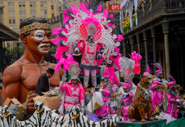 FILE - Zulu King Andrew "Pete" Sanchez, Jr., the 100th Zulu King, takes the turn onto Canal Street from St. Charles Avenue on Mardi Gras, Feb. 17, 2015, in New Orleans. (Matthew Hinton/The Advocate via AP File)