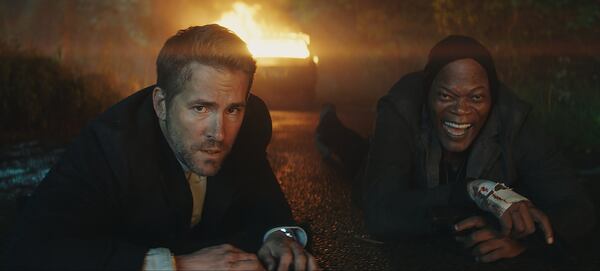 Ryan Reynolds and Samuel L. Jackson appear in the action comedy “The Hitman’s Bodyguard,” opening Aug. 18. CONTRIBUTED BY LIONSGATE