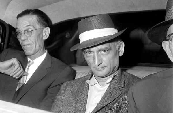 William Fisher, better known by his alias Rudolf Abel, center, was a Soviet spy operating in New York in the 1950s. He was captured as part of the FBI's Hollow Nickel Case and spent four years at the Atlanta Federal Penitentiary before being released to the Soviet Union. His release was part of a prisoner swap for Gary Powers, the American U-2 pilot shot down over the Soviet Union in 1960. The story was recounted in a 1964 book, which served as the basis for the 2015 Steven Spielberg film "Bridge of Spies," starring Tom Hanks. (Marty Lederhandler / AP file)