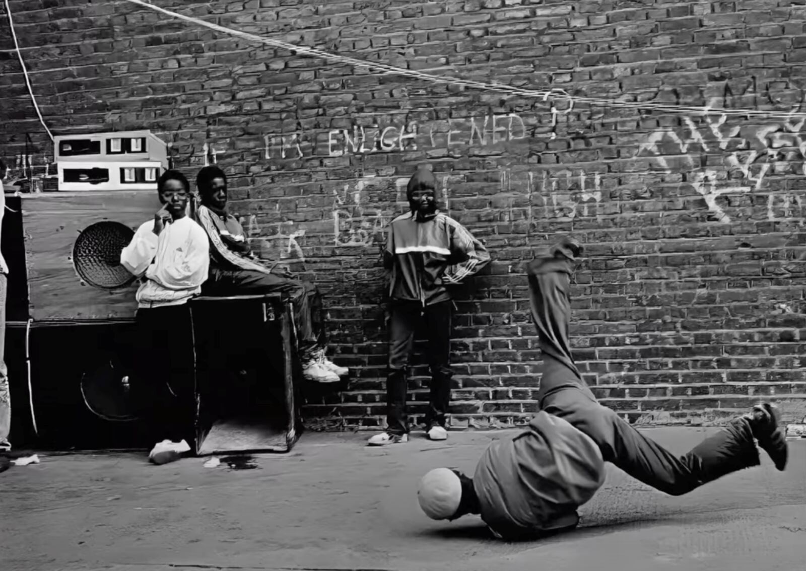 A scene from Tariq Nasheed's documentary "Microphone Check: The Hidden History of Hip-Hop" featuring youth breakdancers and graffiti artists at a neighborhood event in New York in the early 1980s.