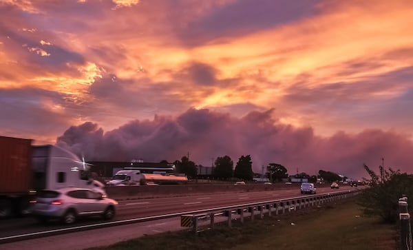 A large plume caused by a chemical reaction Oct. 1 is still visible over the BioLab facility in Conyers, where a fire broke out Sept. 29. John Spink/AJC