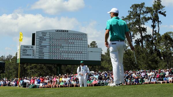 Jordan Spieth stands on the 18th hole as he waits to putt during the first round of the Masters Golf Tournament Thursday, April 7, 2016, at the Augusta National Golf Club in Augusta.