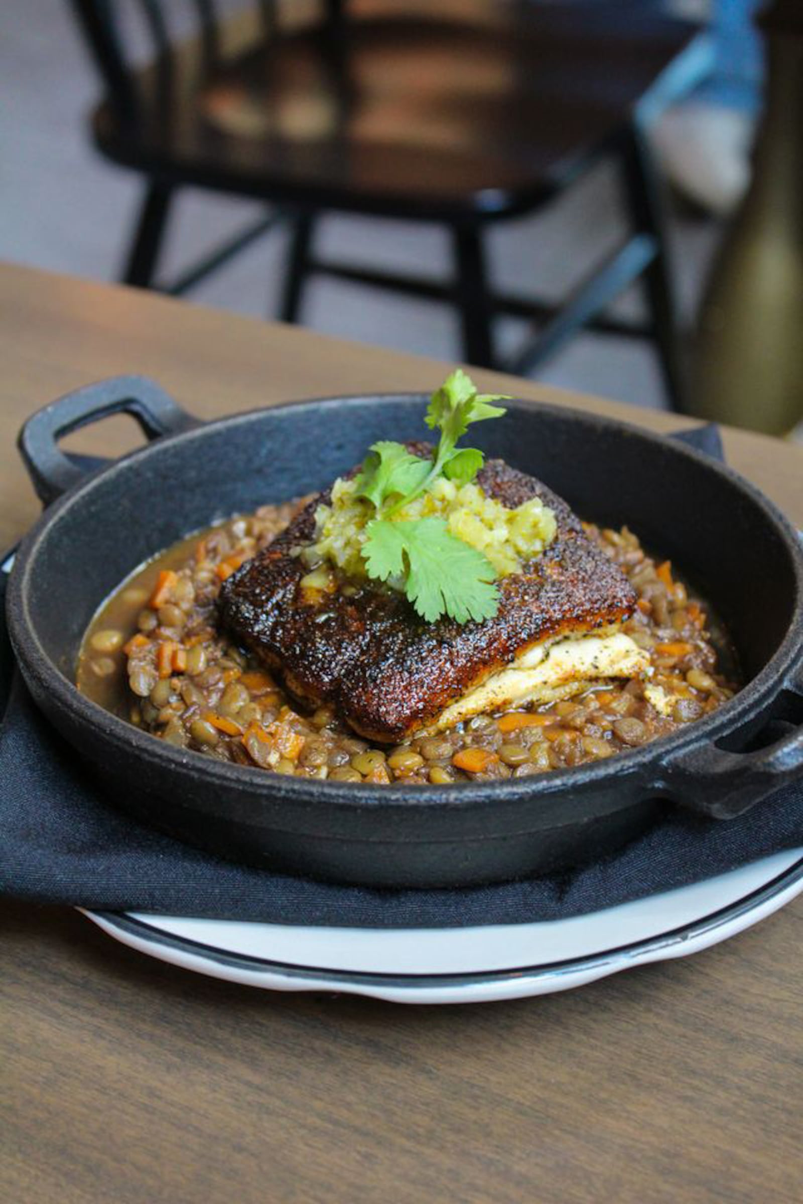 Julio Delgado of Fogon and Lions serves his garlicky green Ajilimojili sauce over grilled fish and other wood-fired dishes. (Courtesy of Fogon and Lions)