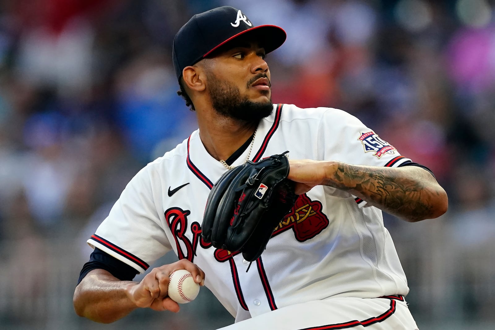 Atlanta Braves starting pitcher Huascar Ynoa delivers in the first inning of a baseball game against the San Francisco Giants, Saturday, Aug. 28, 2021, in Atlanta. (AP Photo/John Bazemore)