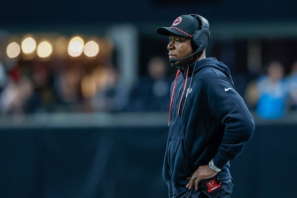 Atlanta Falcons head coach Raheem Morris watches his team fall out in overtime as they take the loss 44-38 against the Caroline Panthers on Sunday, January 5, 2025, at Mercedes-Benz Stadium in Atlanta. 
(Miguel Martinez/ AJC)