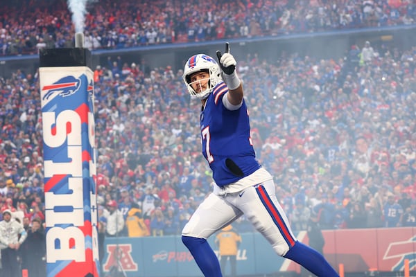 Buffalo Bills quarterback Josh Allen runs onto the field before an NFL football game against the Kansas City Chiefs Sunday, Nov. 17, 2024, in Orchard Park, N.Y. (AP Photo/Jeffrey T. Barnes)