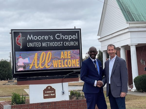 Moore's Chapel UMC pastor Rev. Edward J. Landrum and Rev.  Dr. Robert C. Brown, senior pastor of Carrollton First UMC. The new church will meet in the Moore’s Christian Life Center.