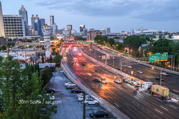 Southbound lanes on the Downtown Connector reopened about 6:30 a.m. Monday. JOHN SPINK / JSPINK@AJC.COM