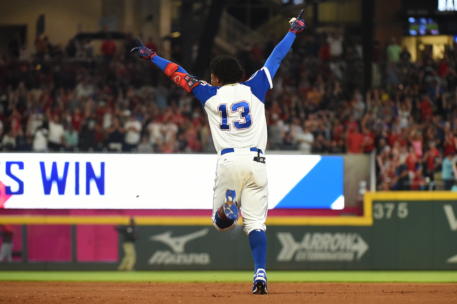 Photos: Ronald Acuna, Braves celebrate a walk-off win over the Reds