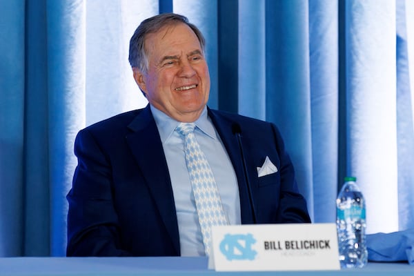 New North Carolina football coach Bill Belichick laughs during an NCAA college football press conference, Thursday, Dec. 12, 2024, in Chapel Hill, N.C.. (AP Photo/Ben McKeown)