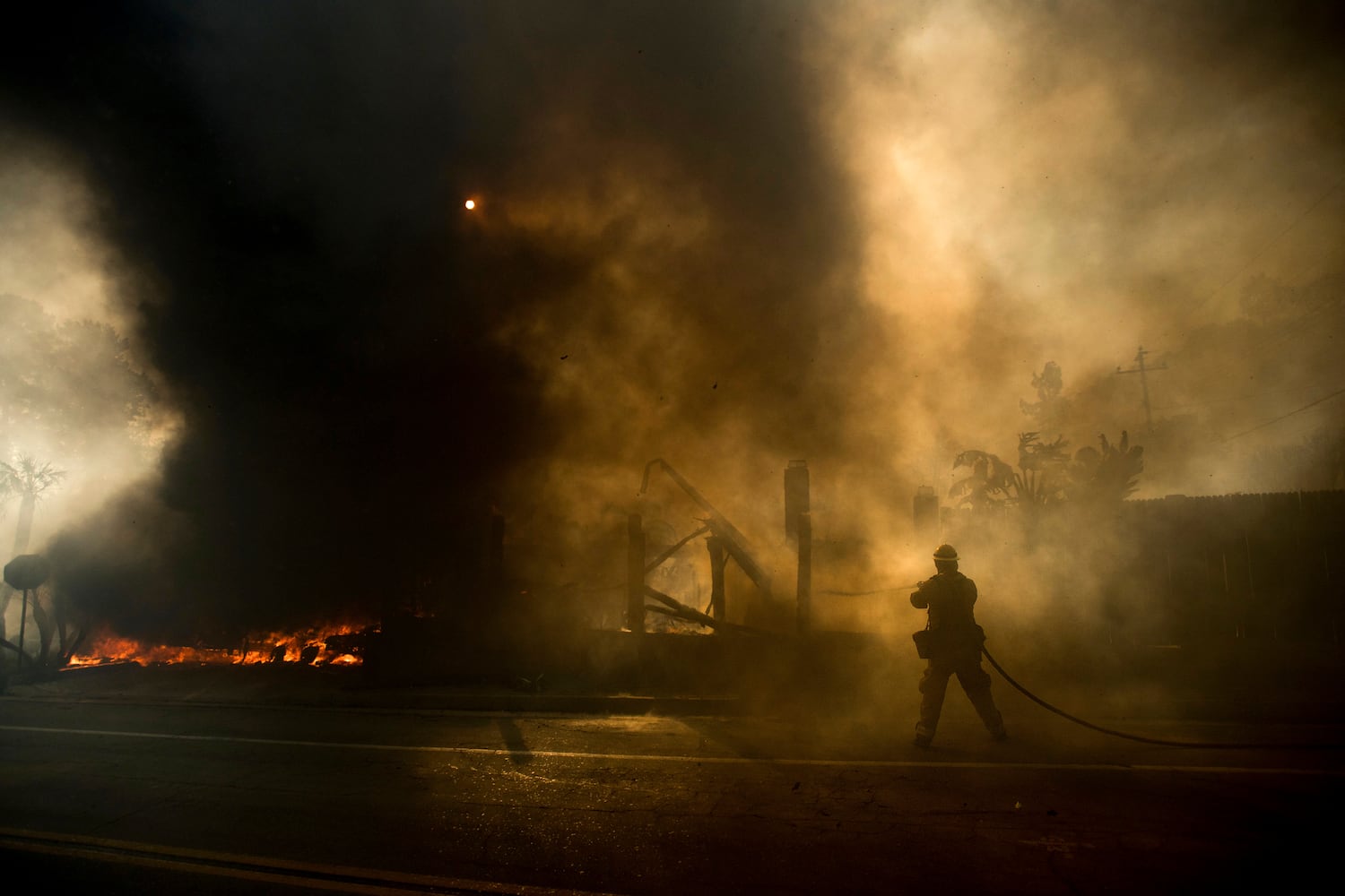 Winds whip up California fires, prompting evacuations