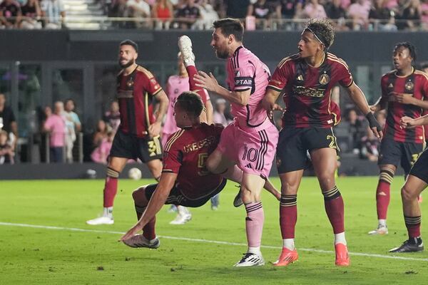 Inter Miami forward Lionel Messi (10) scores a goal during the second half of their MLS playoff opening round soccer match against Atlanta United, Saturday, Nov. 9, 2024, in Fort Lauderdale, Fla. (AP Photo/Lynne Sladky)