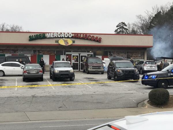 Police have made a second arrest in the case of a Roswell business owner who was shot and killed Saturday afternoon in an apparent robbery attempt.