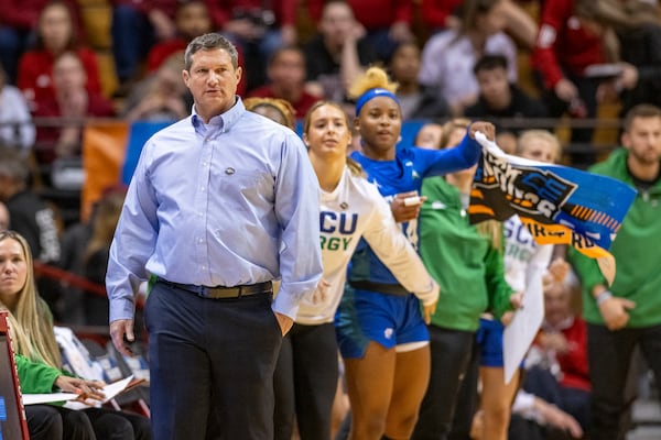 Florida Gulf Coast head coach Karl Smesko watches play on the court during a first-round college basketball game against Oklahoma in the NCAA Tournament, Saturday, March 23, 2024, in Bloomington, Ind. (AP Photo/Doug McSchooler)