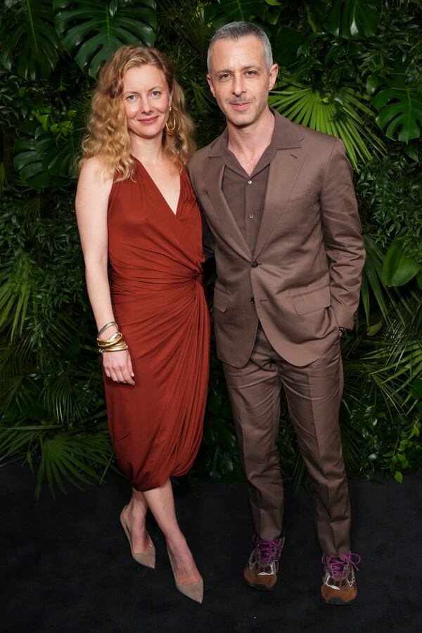 Emma Wall, left, and Jeremy Strong arrive at Chanel's 16th Annual Pre-Oscar Awards Dinner on Saturday, March 1, 2025, at The Beverly Hills Hotel in Beverly Hills, Calif. (Photo by Jordan Strauss/Invision/AP)