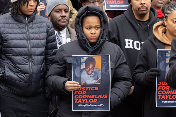 Family members and activists protest the death of Cornelius Taylor, an unhoused man killed when the city cleared an encampment last week, in front of City Hall in Atlanta on Thursday, January 23, 2025. (Arvin Temkar / AJC)