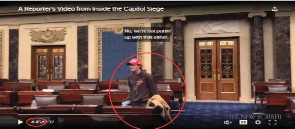 Milton resident Bruno Cua is seen here on the floor of the U.S. Senate during the Jan. 6, 2021 U.S. Capitol riot.