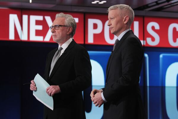 Wolf Blitzer and Anderson Cooper broadcast live from the Election Center in Washington, D.C. on Election Day. Wolf Blitzer and Anderson Cooper broadcast live from the Election Center in Washington, D.C. on Election Day.