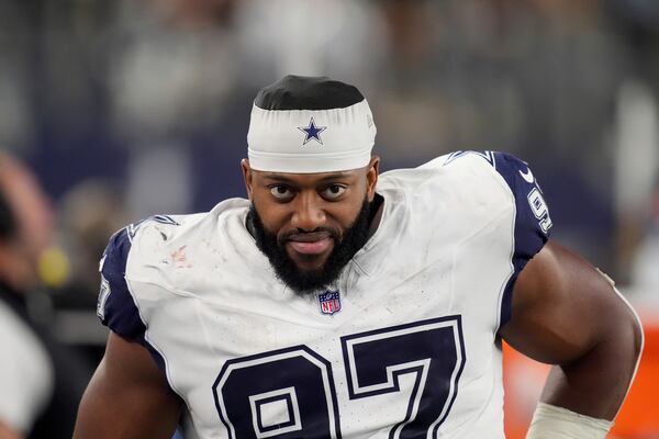 Dallas Cowboys defensive tackle Osa Odighizuwa walks along the sideline during an NFL football game against the Cincinnati Bengals in Arlington, Texas, Monday, Dec. 9, 2024. (AP Photo/Tony Gutierrez)