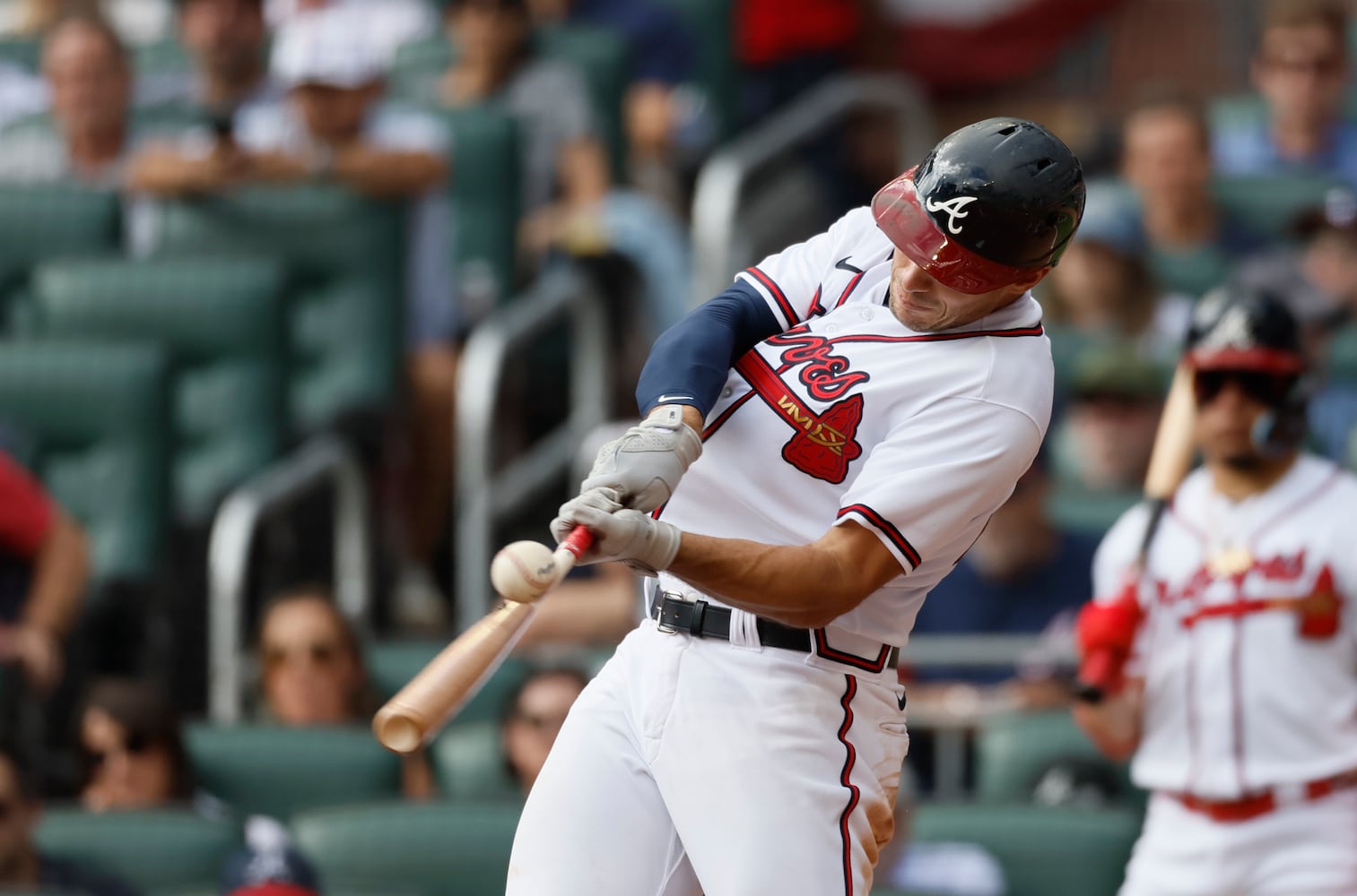 Atlanta Braves' Matt Olson singles during the third inning of game one of the baseball playoff series between the Braves and the Phillies at Truist Park in Atlanta on Tuesday, October 11, 2022. (Jason Getz / Jason.Getz@ajc.com)