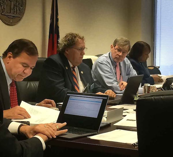 The Georgia Composite Medical Board licenses and disciplines physicians. Pictured from left in this 2017 photo are board members Dr. John Antalis, Dr. John Jeffrey Marshall, Dr. E. Dan DeLoach and Executive Director LaSharn Hughes.