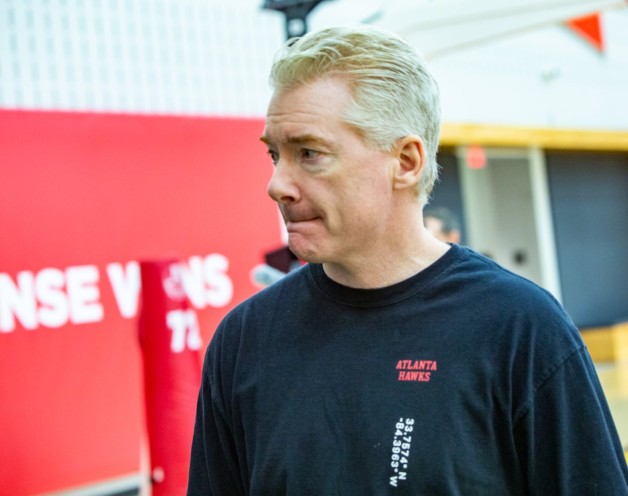 Hawks Interim Head Coach Joe Prunty moves off the practice court to answer questions about his new role on Wednesday, Feb 22, 2023 at the team’s practice facility now that the decision to fire Head Coach Nate McMillan was made.(Jenni Girtman for The Atlanta Journal-Constitution)