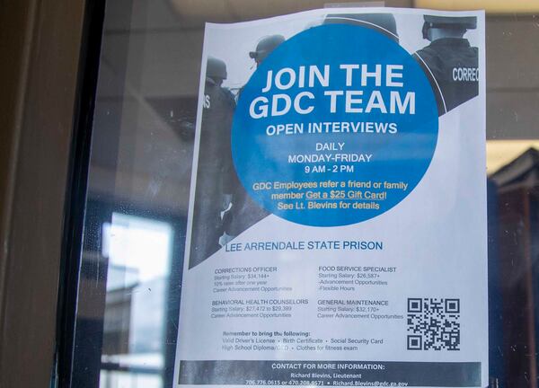 A Georgia Department of Corrections hiring flyer is displayed in the visitors lobby at Lee Arrendale State Prison in Alto, Georgia, on August 11, 2021.  (Alyssa Pointer/Atlanta Journal Constitution)