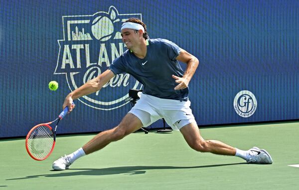 Taylor Fritz returns the ball to J.J. Wolf during a semifinal match at the 2023 Atlanta Tennis Open at Atlantic Station, Saturday, July 29, 2023, in Atlanta. (Hyosub Shin / Hyosub.Shin@ajc.com)