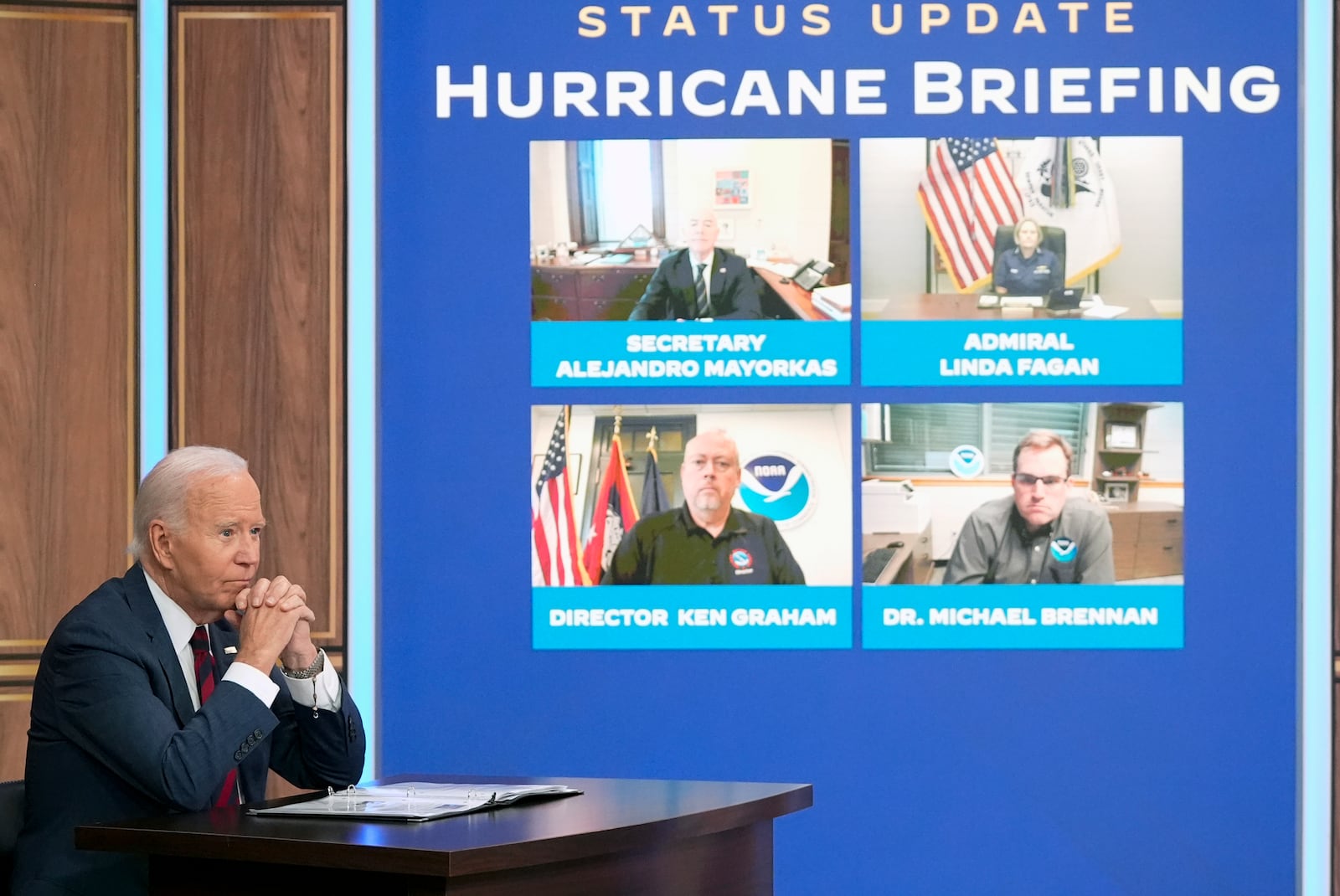 President Joe Biden, joined virtually by Vice President Kamala Harris and by Elizabeth Sherwood-Randall, Homeland Security Advisor to the President, not shown, listens to a briefing about preparations for Hurricane Milton and the response to Hurricane Helene in the South Court Auditorium on the White House complex in Washington, Wednesday, Oct. 9, 2024. (AP Photo/Mark Schiefelbein)