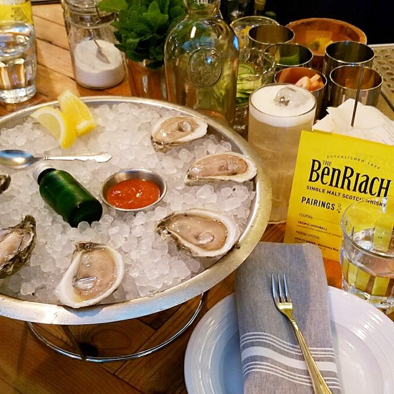 Disco Hama oysters are paired with BenRiach 10 year peated whisky at Watchman's.