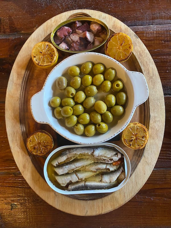 Boho115 offers a variety of Espinaler brand tinned fish and seafood, imported from Spain. Ligaya Figueras/ligaya.figueras@ajc.com