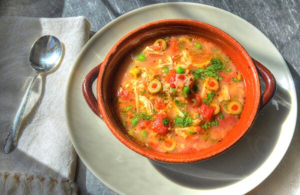 Asopao de Pollo (Puerto Rican Chicken and Rice Soup), a comforting soup from the 2019 edition of “Joy of Cooking” (Scribner, $40), is easy to put together and would be perfect for a game day get-together. “Joy” co-authors John Becker and Megan Scott use their leftover Thanksgiving turkey in place of the chicken. STYLING BY WENDELL BROCK / CONTRIBUTED BY CHRIS HUNT PHOTOGRAPHY