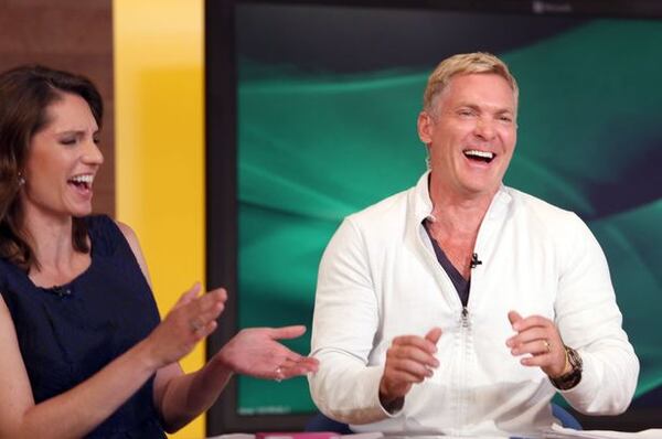 Maria LaRosa with Sam Champion. CREDIT: AJC