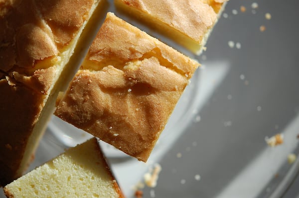 Whether plain (as shown here) or topped with whipped cream and fruit, Irish Butter Cake is a delightful treat for St. Patrick's Day, or any other day. (Meridith Ford for The Atlanta Journal-Constitution)