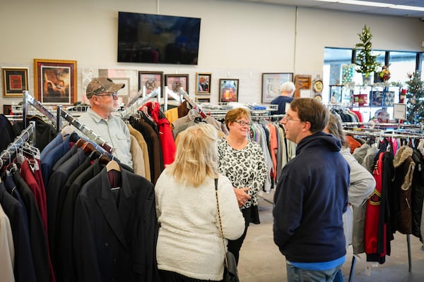 Customers and staff mingle at the MUST Marketplace store in East Cobb. 