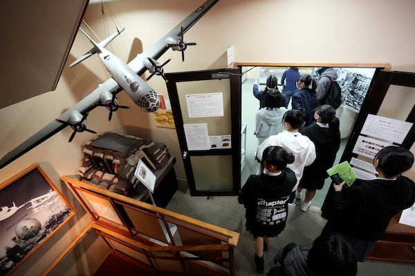 Middle school students from Niigata on a school trip visit the exhibits at the Center of the Tokyo Raids and War Damage, on Feb. 24, 2025, in Tokyo. (AP Photo/Eugene Hoshiko) (AP Photo/Eugene Hoshiko)