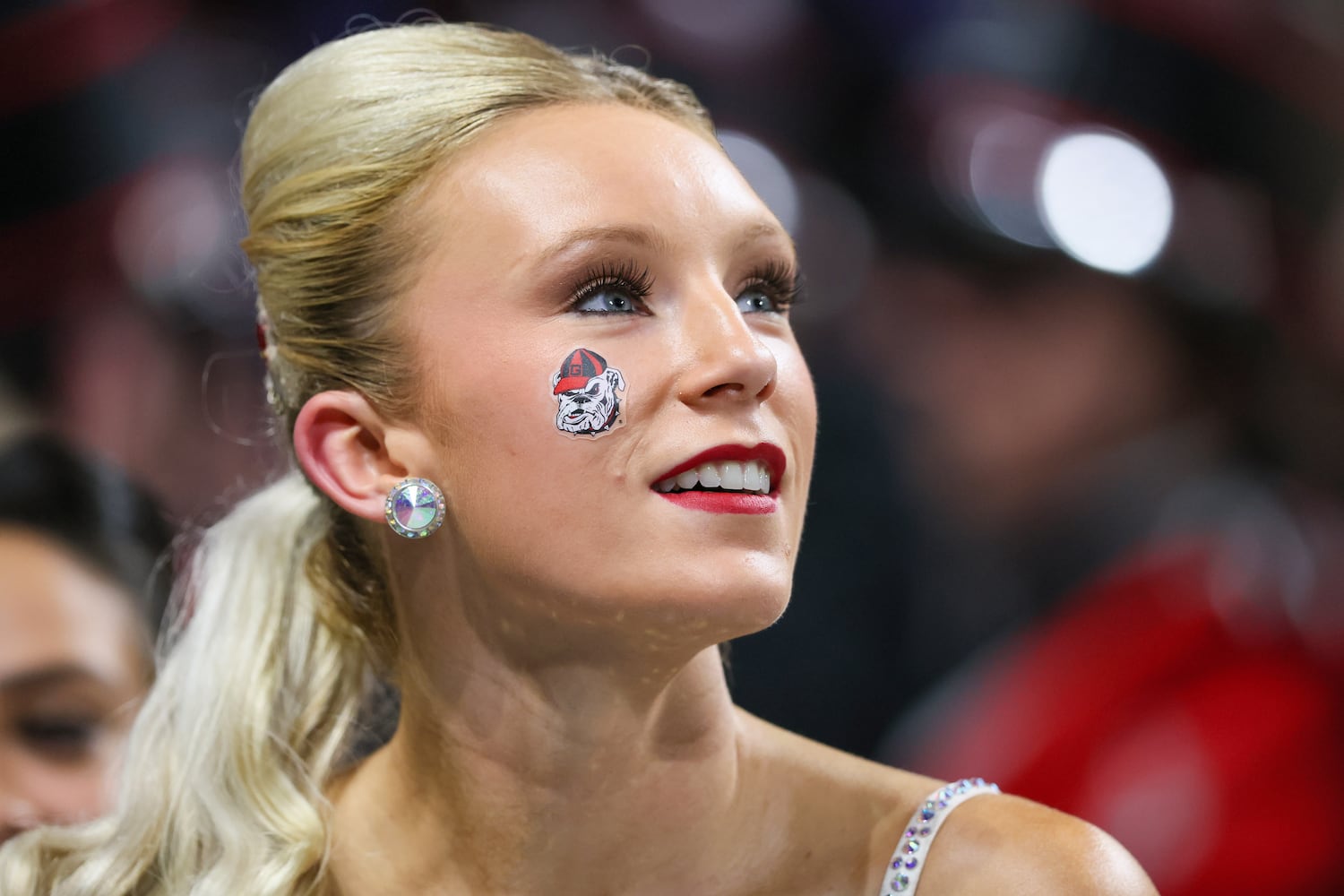 A Georgia Bulldogs spirit team member watches before the first half of the SEC Championship football game at the Mercedes-Benz Stadium in Atlanta, on Saturday, December 2, 2023. (Jason Getz / Jason.Getz@ajc.com)