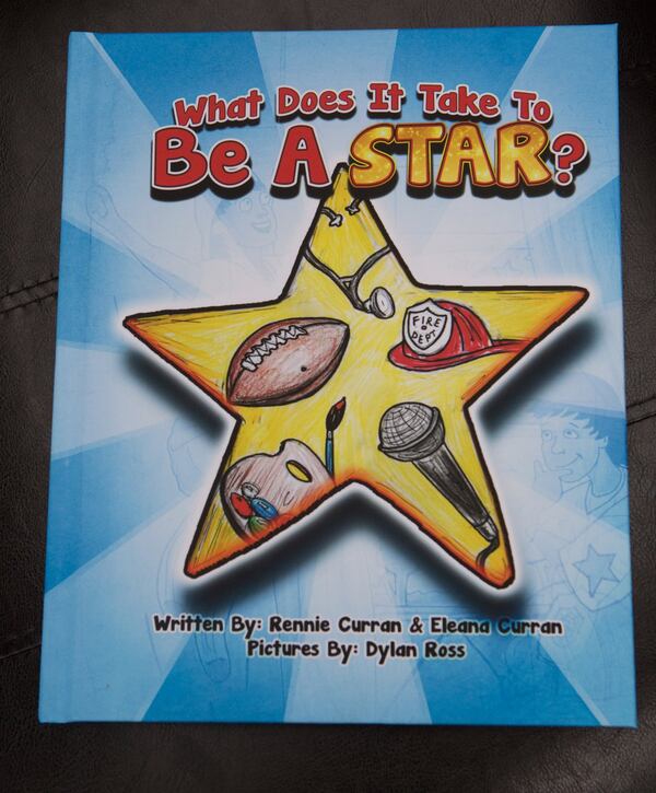 Rennie Curran and his 8-year-old daughter, Eleana, wrote a book together: “What Does It Take to Be a Star?” CONTRIBUTED BY PHIL SKINNER