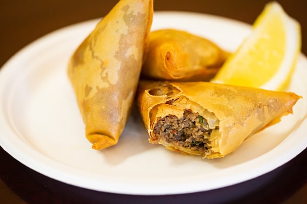 Samosas are among the menu offerings at Jambo Grill that reflect the Indian influences in Kenyan cuisine. Ryan Fleisher for The Atlanta Journal-Constitution