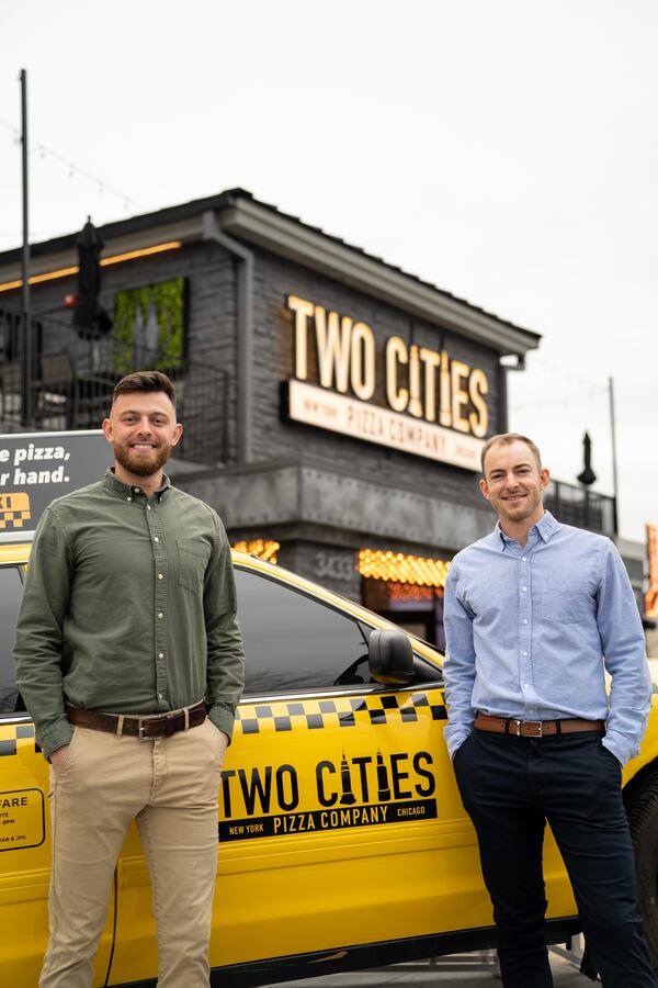 Zach Greves (left) and Sean Spurlock are the owners of Two Cities Pizza Co.