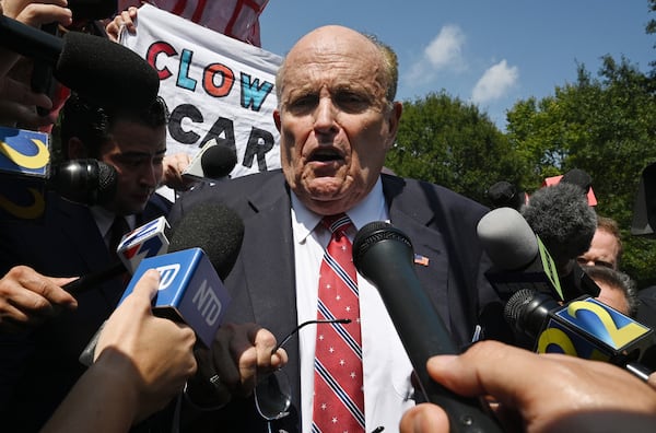 Rudy Giuliani speaks to members of the press before he leaves outside the Fulton County Jail, Wednesday, August 23, 2023, in Atlanta. (Hyosub Shin / Hyosub.Shin@ajc.com)