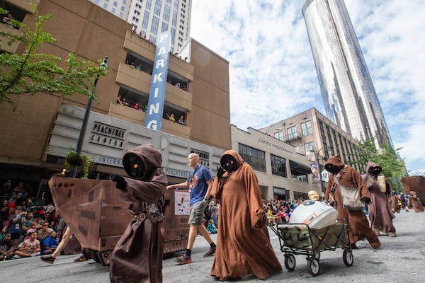 Star Wars Ewoks participate in the annual DragonCon Parade on Andrew Young International Boulevard on Saturday, Sept 2, 2023.  (Jenni Girtman for The Atlanta Journal-Constitution)