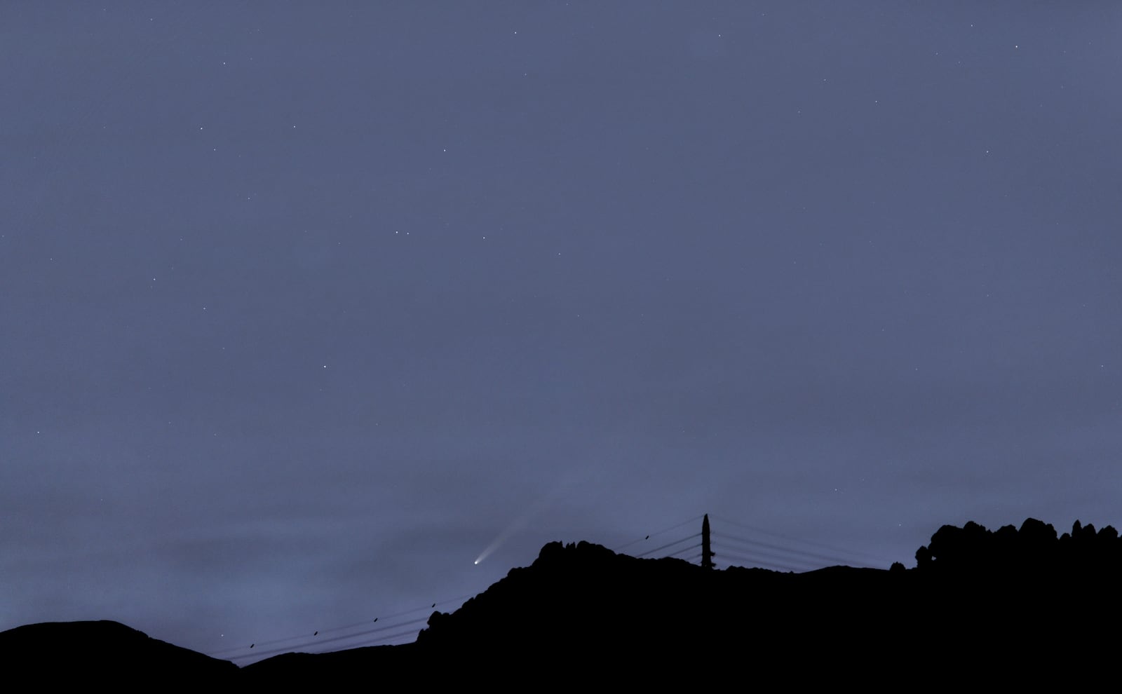 This photo provided by Nicolas Biver shows Comet C/2023 A3 (ATLAS-Tsuchinshan) as seen in the night sky of Granada, Spain, on Tuesday, Oct. 1, 2024. (Nicolas Biver via AP)