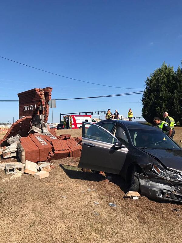 A driver crashed into a brick Department of Public Safety sign in Alpharetta.