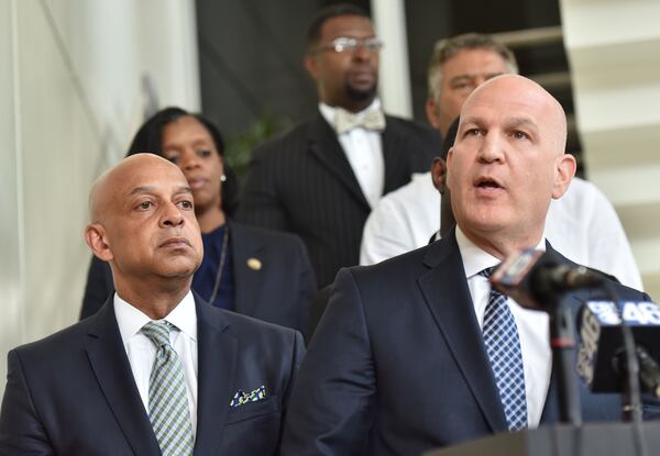 Defense attorney Noah Pines (right) speaks at a press conference in Decatur on May 12, 2017, alongside then-client Jeffrey Mann. (HYOSUB SHIN / HSHIN@AJC.COM0