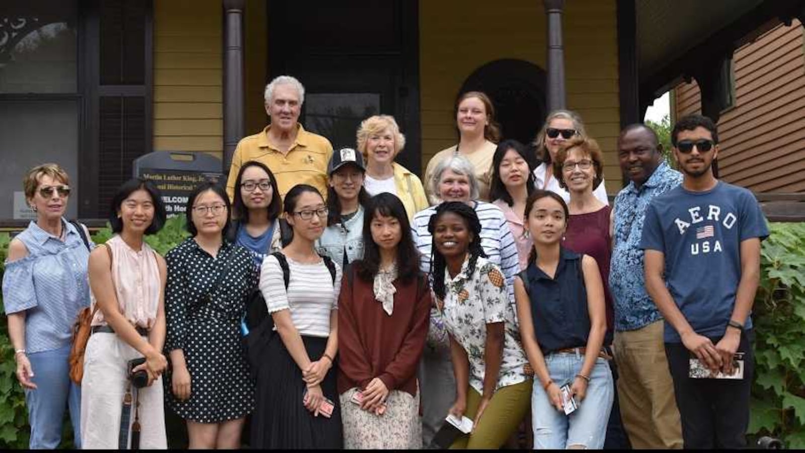 International students involved in the Atlanta Ministry with International Students pose outside the childhood home of the Rev. Martin Luther King Jr. The organization helps ease the transition of international college students to the Atlanta area. CONTRIBUTED