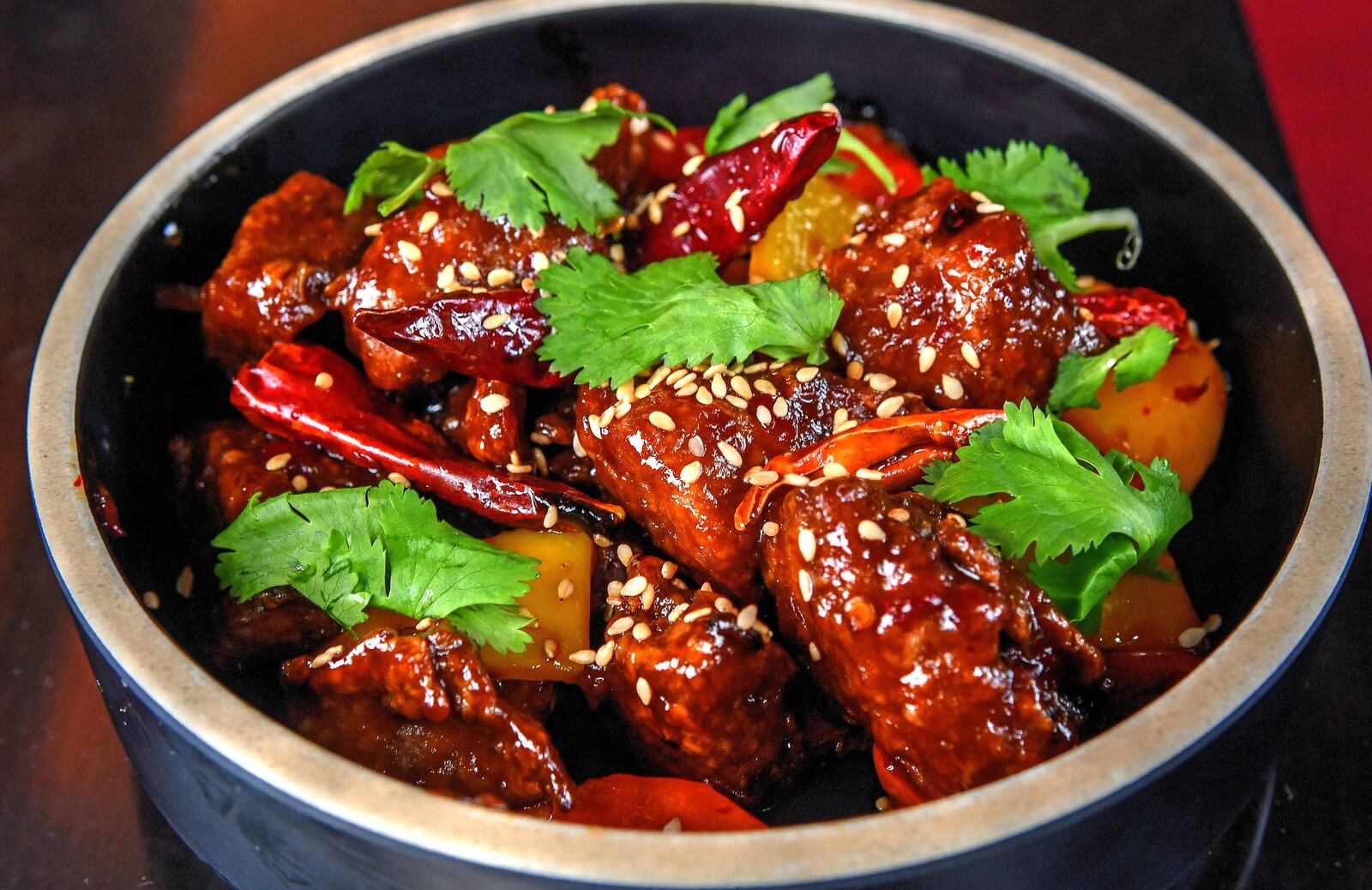 Vegetarian General Tso's Chicken, plant-based chicken, spicy sweet soy. CONTRIBUTED BY CHRIS HUNT PHOTOGRAPHY