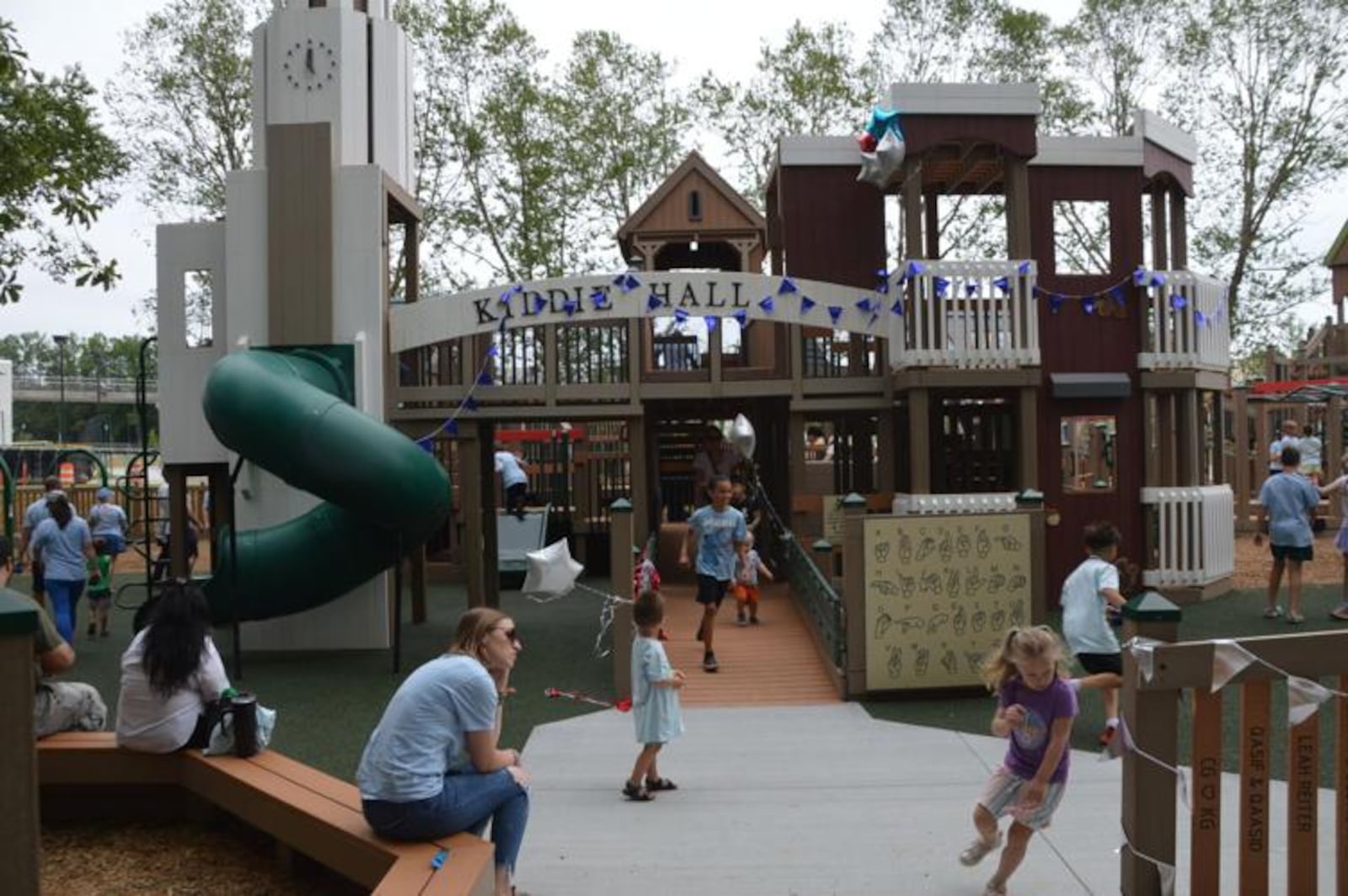 Kids play in the new PlayTown Suwanee playground after its opening at Town Center on Main Park. The new playground replaces the original PlayTown Suwanee, which opened 20 years ago. (Photo Courtesy of Curt Yeomans)