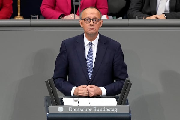 Opposition leader Friedrich Merz of CDU speaks during a plenary session at the German parliament Bundestag where he faces a vote of confidence, Berlin, Germany, Monday, Dec. 16, 2024. (AP Photo/Markus Schreiber)