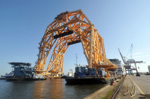 The twin-hull heavy lift vessel VB-10,000 uses its dynamic positioning system to maneuver into its mooring at the Port of Fernandina, Fla., July 3, 2020, for final modifications and function checks prior to heading to St. Simons Sound. The two 255-foot-tall gantries will use lengths of chain to cut the capsized vessel Golden Ray into eight pieces and lift them onto barges for eventual transportation to Louisiana for recycling. Courtesy of U.S. Coast Guard Chief Petty Officer John D. Miller